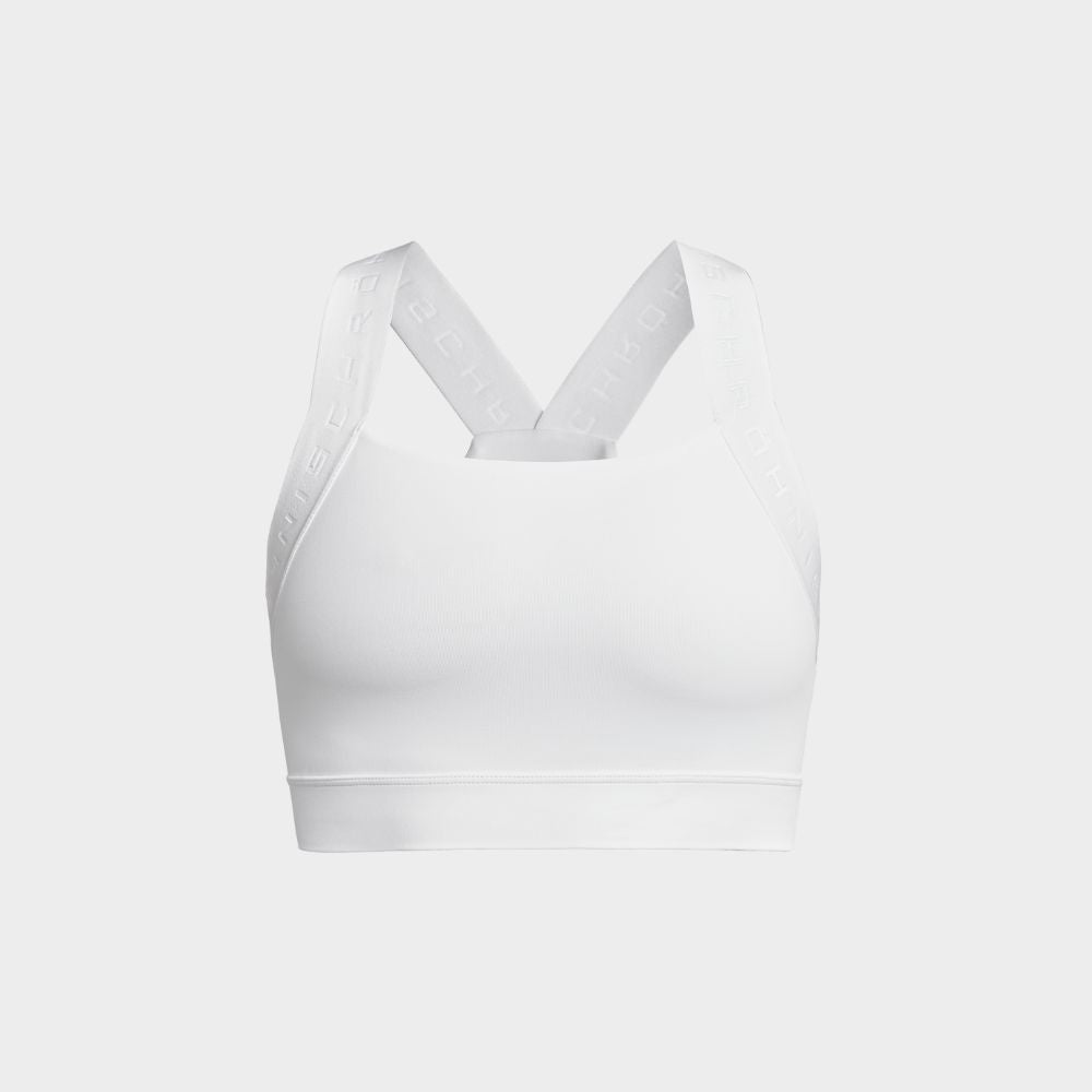 Röhnisch Kay Sports Bra White – produktbild på vit högsupport sport-bh framifrån och bakifrån